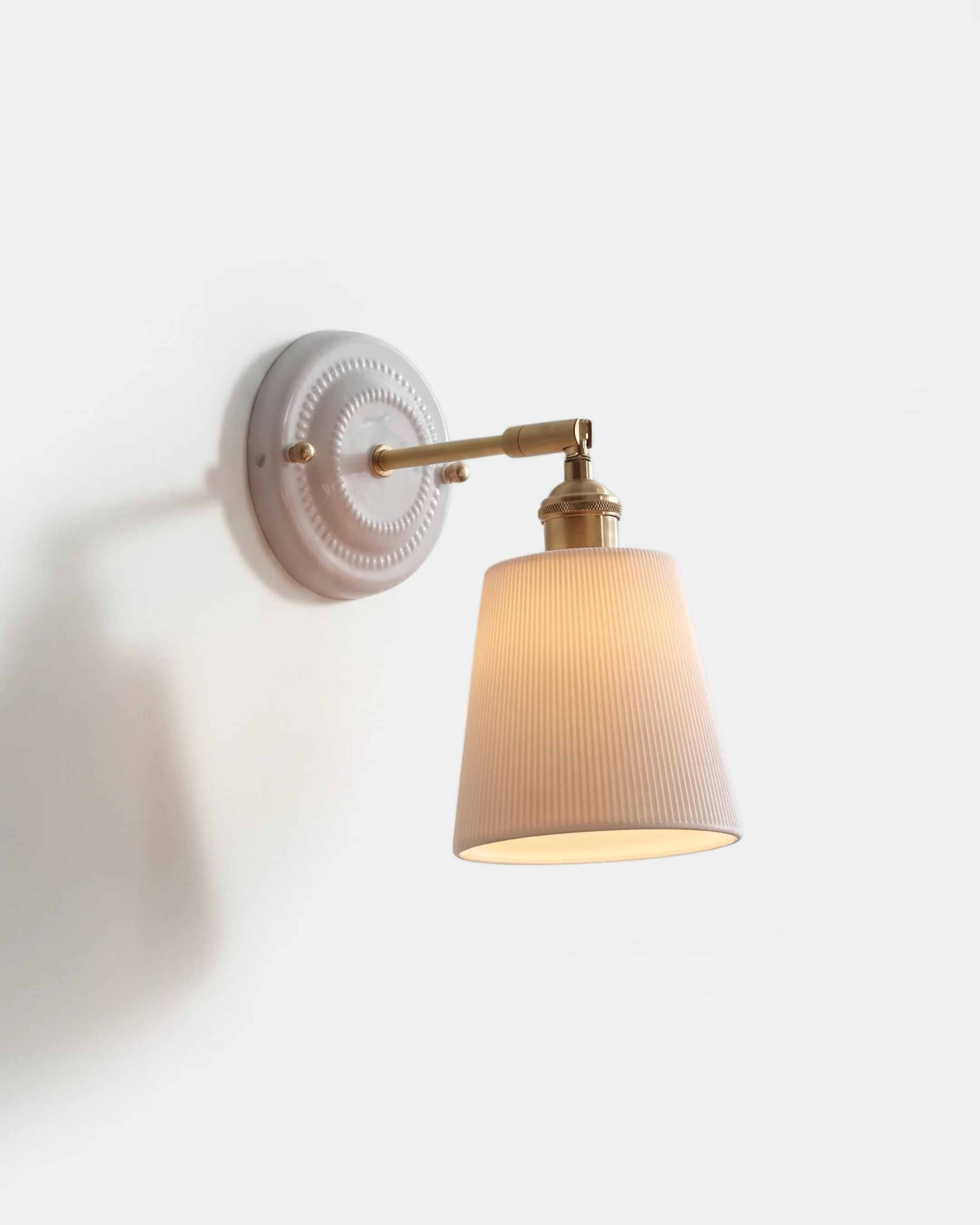 Wall Sconce Ceramic and Brass Fluted Shade | Plosio